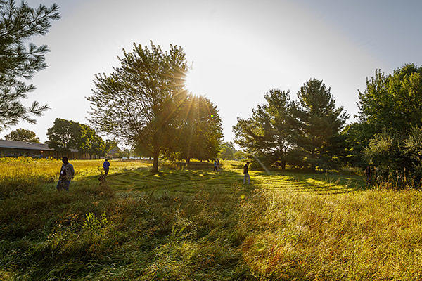 Students walk the prayer labyrinth on the AMBS campus. (Credit: Peter Ringenberg)
