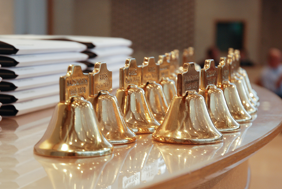 Bells and diplomas at AMBS commencement.