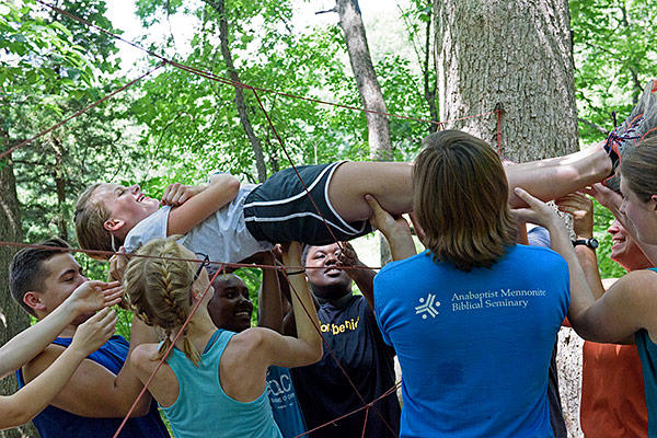 The Explore 2018 group participates in trust-building exercises during their visit to Amigo Centre, Sturgis, Michigan. (Credit: Jason Bryant)