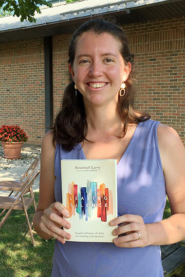 Susannah Larry, PhD, with her book, Leaving Silence